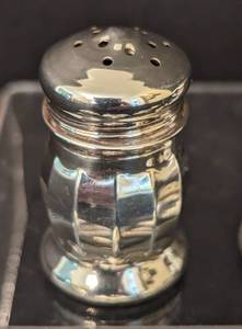 lot 53 image: Three Sterling Silver Salt and Pepper Shaker Sets