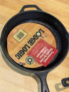 lot 137 image: Lodge and Our Table Cast Iron Skillets