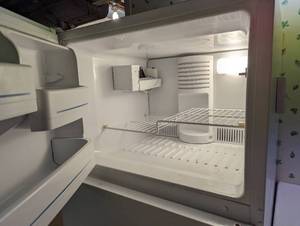 lot 177 image: G.E. White Refrigerator