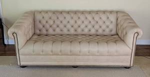 lot 22 image: Tufted Cream Leather Sofa