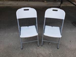 lot 63 image: Pair of Plastic Folding Chairs