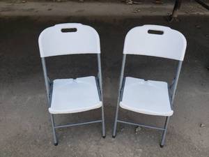 lot 64 image: Pair of Plastic Folding Chairs