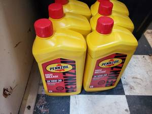 lot 113 image: 6 Quarts of High Mileage 10w30 Pennzoil Oil