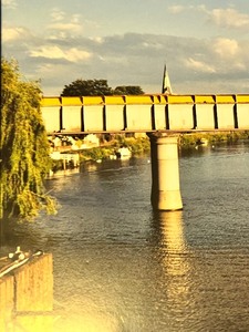 lot 79 image: Large Framed Wall Hanging Photo of a Metal Railway Bridge Spanning over the River Thames