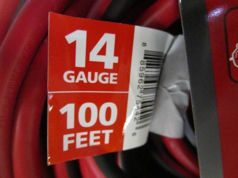 lot 58 image: Husky 100 ft. 143 IndoorOutdoor Extension Cord, Red and Black - NEW