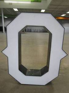 lot 127 image: Lighted Letter O Outdoor Signage, Transformer Not Included. Approximate Dimensions 24 x 5.25 x 28 Tall - USED FOR RETAIL BRAND MN HOME OUTLET.