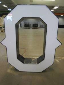 lot 130 image: Lighted Letter O Outdoor Signage, Transformer Not Included. Approximate Dimensions 24 x 5.25 x 28 Tall - USED FOR RETAIL BRAND MN HOME OUTLET.