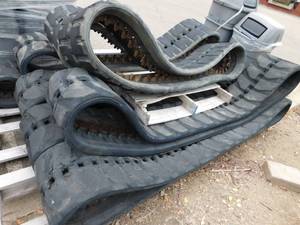 lot 16 image: 3 Sets of Used Excavator Tracks and 1 Set of Bobcat Skid Steer Tracks