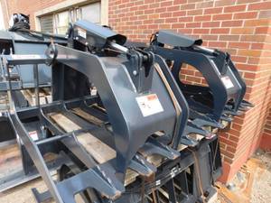 lot 14 image: NEW Stout 69-6 Skid Steer Grapple Attachment