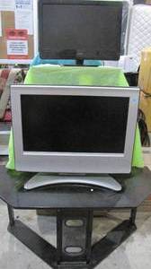 TV Stand, TV and a Monitor
