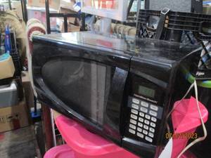 Black digital countertop microwave