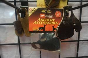 lot 105 image: PSE and Kantpinch Brands Bow Hunters Snap On Finger Tabs In Assorted Styles