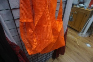 lot 136 image: Large Blaze Orange Mesh Gear Bag With Shoulder Straps