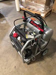 Husky 4.5 Gal. Portable Electric-Powered Silent Air Compressor   Customer Returns See Pictures
