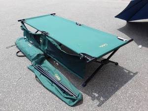 lot 1 image: Pair Of Cabelas Heavy Duty Camping Cots With Organizer