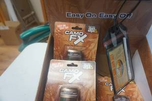 lot 111 image: 4 Packs Camo FX Face Point With Crooked Horn License Tag Kit and Scent Shield Hot Doe Gel