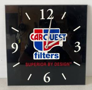 lot 22 image: Vintage Acrylic CarQuest Filters Battery Operated Clock