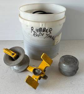lot 25 image: Bucket Of Bungee Rubber And A Beam Pulley