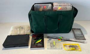 lot 42 image: Turck Works Soft Side Tackle Box Filled With Fishing Tackle And More ( Broken Zipper )