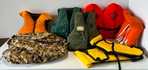 lot 83 image: Large Group Of Misc. Sixe Life Jackets Including Steans, Fido And More In Canvas Bag