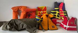 lot 98 image: Group Of Life Jackets Including Stearns And More With Canvas Green Duffle Bag ( Possible Military See Photo 21 )