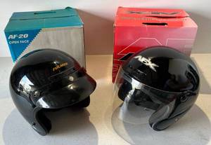lot 101 image: Two Motorcycle Helmets 1 Arther Fulmer ( AF20 ) Visor Only ( Size L ) 1 AFX FX-4 (Lemans) ( Size L ) With Boxes
