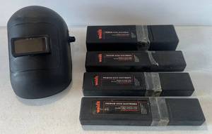 lot 112 image: 4 Cases Of Premium Stick Electrodes 2 332 5LB 1 18 5LB 1 532 10LB And Welding Helmet