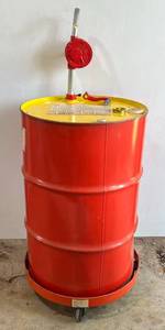 lot 126 image: Unused 55 Gallon Drum Of Shell Rotella T 15W- 40 Motor Oil ( 13 Full Roughly 18 Gallons ) With Pump And Jet Brand 55 Gallon Steel Drum Dolly