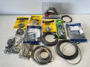 lot 151 image: Group Of Misc. Garage Door Parts Including Cables And More ( Most NIB )