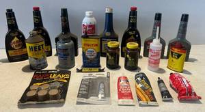 lot 165 image: Group Of Misc. Automotive Fluids Including heet, Sea-Foam And More