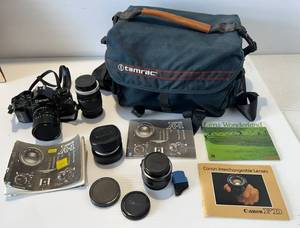 lot 272 image: Cannon AE-1 With Lenses And Extras