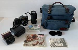 lot 297 image: Cannon T70 Camera, Lenses, Carrying Case And More
