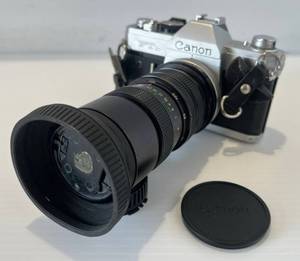 lot 300 image: Vintage Cannon FTB QL 35MM Camera With Lens (Has Dent By F On FTB )