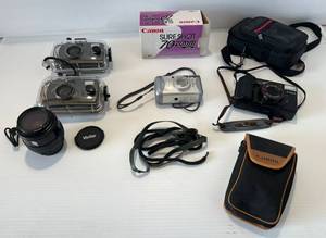 lot 301 image: Group Of Misc. Vintage Cameras 2 Have Waterproof Underwater Case