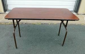 lot 12 image: 4 Foot Indoor Laminate Folding Table