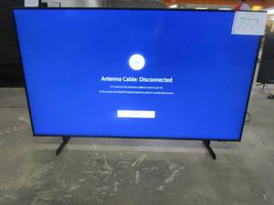 lot 777 image: Samsung - 55 Class 8000 Series LED 4K UHD Smart Tizen TV ModelUN55AU8000FXZA - SCRATCH ABOVE CENTER