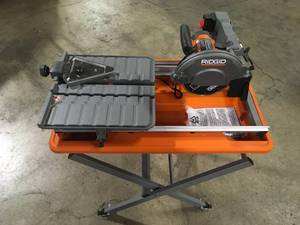 RIDGID 9 Amp Corded 7 in. Wet Tile Saw with Stand Customer Returns See Pictures