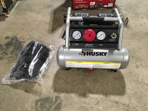 Husky 1 Gal. Portable Electric-Powered Silent Air Compressor   Customer Returns See Pictures