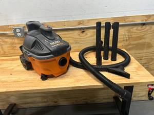 lot 71 image: RIDGID 4 Gallon 5.0 Peak HP Portable WetDry Shop Vacuum with Fine Dust Filter, Locking Hose and Accessories