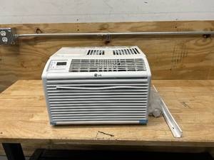 lot 61 image: LG 6,000 BTU 115-Volt Window Air Conditioner LW6017R Cools 250 Sq. Ft.
