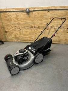 lot 23 image: MURRAY 21 in. 140 cc Briggs and Stratton Walk Behind Gas Push Lawn Mower with Height Adjustment and with Mulch Bag