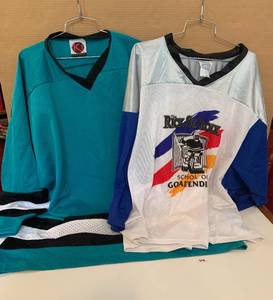 lot 44 image: Hockey Shirts TealBlack XXL