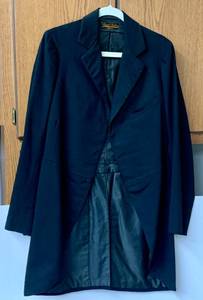 lot 48 image: The Royal Tailors Black Long Jacket