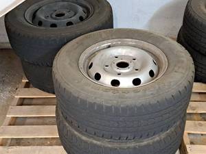lot 745 image: Lot of (4) Firestone 23565R16 Tires with 16 5-lug Steel Rims