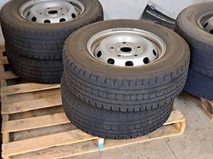 lot 746 image: Lot of (4) Firestone 23565R16C Tires with 16 5-lug Steel Rims