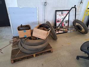 lot 547A image: Vintage Ford Model A Car Parts - Wheels, Tires, Axle Assembly, Brake Parts, Misc. Parts