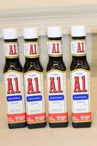 lot 135 image: 4 Bottles of A1 Steak Sauce Best By 62025