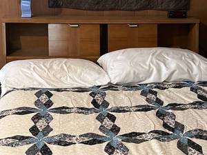 Mid-Century Bed with Quilt