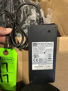 Box of AC Power Adapters with Wall Plug Ins