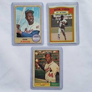 lot 5 image: Lot of 3 Hank Aaron 1972 In Action No. 300, 1972 Topps No. 415, 1968 Topps No. 110